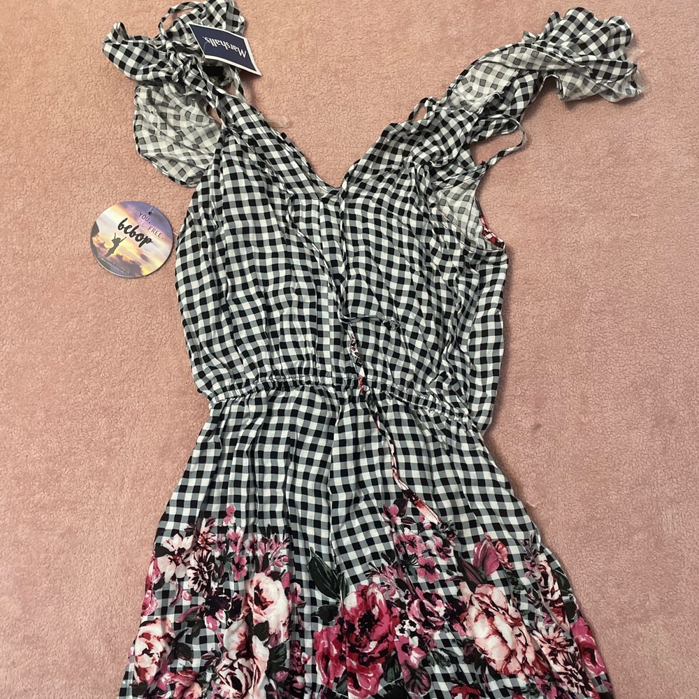 Super cute checkered and floral romper